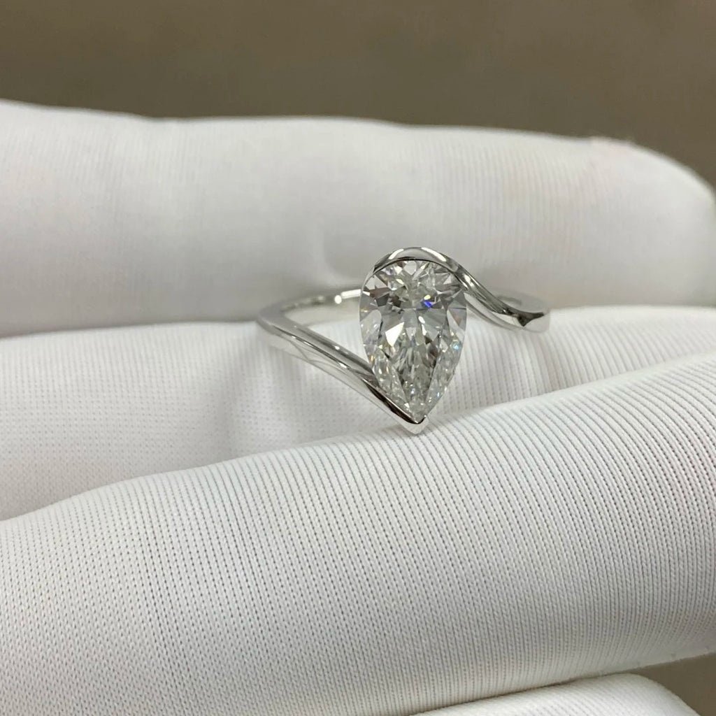 Pear Cut Diamond Twist Ring | Minimalist Engagement Ring | NovaVow Rings