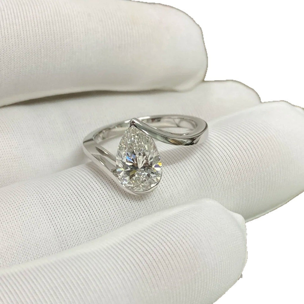 Pear Cut Diamond Twist Ring | Minimalist Engagement Ring | NovaVow Rings